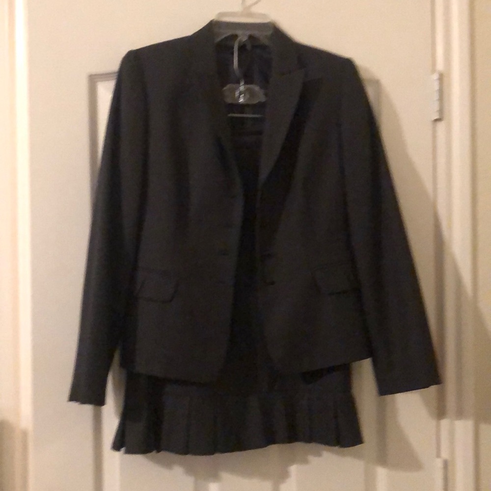 Two piece skirt suit by Tahari